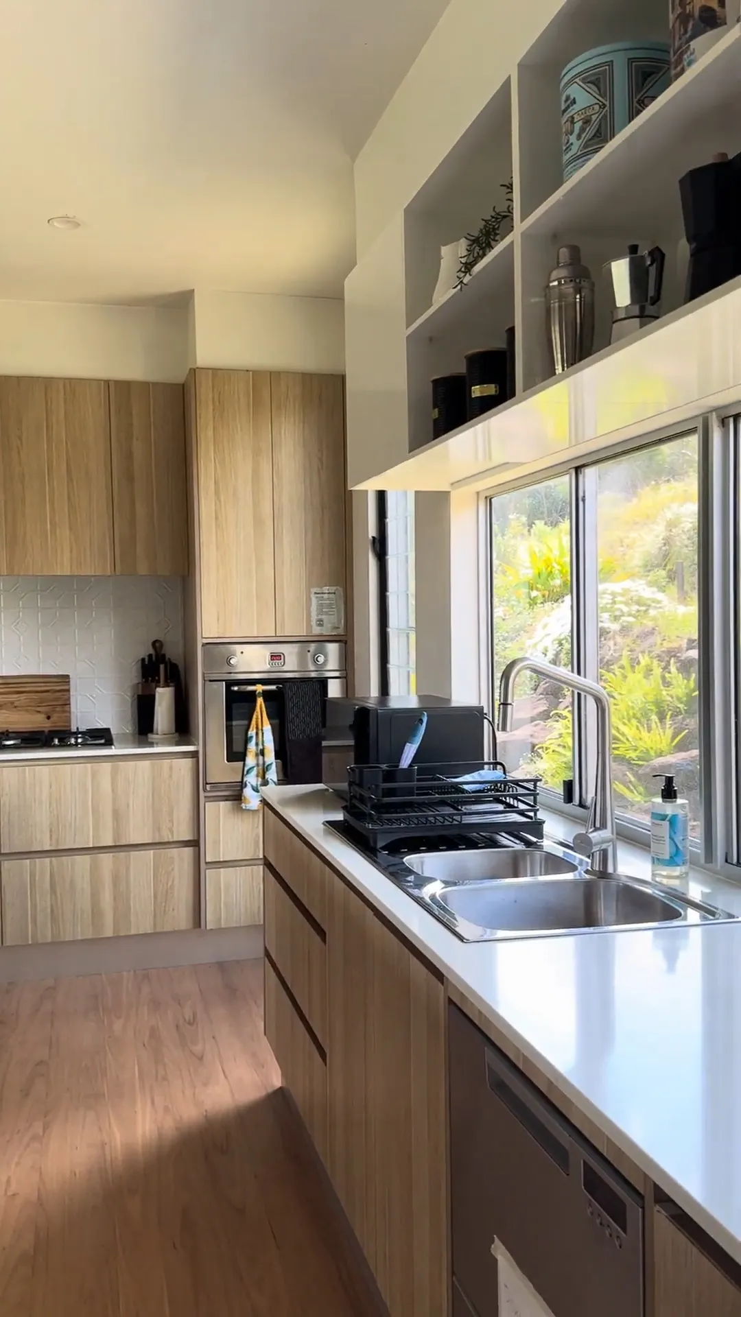 Tidy, sunlit kitchen kept up by regular visits